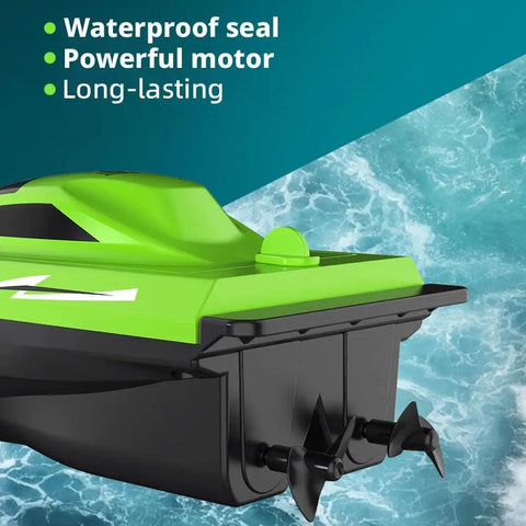 Close-up of the green Ultra Fast Dual Motor RC Boat with waterproof seal on blue water, showing powerful motor and hull design.