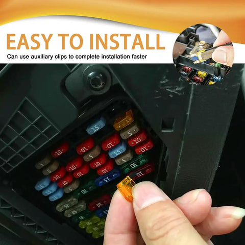 Person holding an orange blade fuse near an electrical box, showcasing the Heavy Duty Car Fuse Assortment Kit with 5A Through 30A.