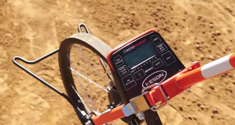 Built Tough Electronic Measuring Wheel With Spoked Steel Frame And Thumb Up Grip Featuring Dirt Busting Magnetic Pickup And Fully Sealed Counter For Tradesmen And Weekend Warriors