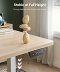 CubiCubi Large Electric Height Adjustable Standing Desk Maple Surface showing control panel and stability at full height.