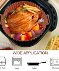 Chicken and fries in Two Pack 8 Inch Square Air Fryer Silicone Liners Non Stick Reusable Parchment Alternative Easy Cleanup.