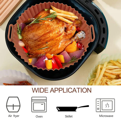 Chicken and fries in Two Pack 8 Inch Square Air Fryer Silicone Liners Non Stick Reusable Parchment Alternative Easy Cleanup.