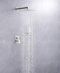 Wall Mounted Shower System With 12 Inch Rainfall Shower Head And Handheld Combo Brushed Nickel Finish Fingerprint Resistant Includes Rough In Valve Body And Trim Easy Clean And Durable Water Pressure Boost showing water flow on gray tile wall.