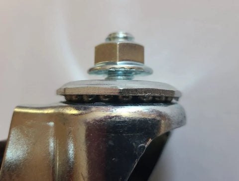 Side view of a 5 Inch Polyolefin Caster Wheel With Swivel Stem For Steel Convertible Hand Trucks Replacement One And A Quarter Inch Stem