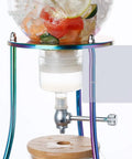 Craft Hella Smooth Cold Brew Coffee And Iced Tea With This No Sweat Dripper featuring glass jar and adjustable water flow.