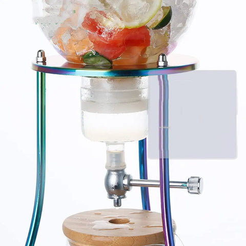 Craft Hella Smooth Cold Brew Coffee And Iced Tea With This No Sweat Dripper featuring glass jar and adjustable water flow.