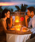 Couple dining with LED Flame Light Bulbs 4 Pack E26 Base Flickering Fire Effect 4 Modes Outdoor Halloween Decor glowing