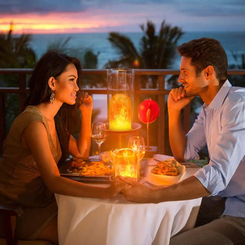 Couple dining with LED Flame Light Bulbs 4 Pack E26 Base Flickering Fire Effect 4 Modes Outdoor Halloween Decor glowing
