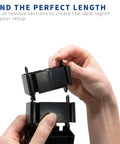 Hands adjusting Clamp On Desk Cable Management Kit With Vertebrae System, No Drill And Adjustable Quad Entry Cord Organizer for home office.