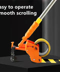Slick Manual Floor Masking Tape Applicator For Warehouse Aisle Marking And Safe Zone Layout No Sweat Vinyl Line Dispenser showing sturdy design and wheel.