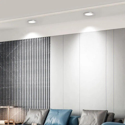 UWYTGF 13 Pack Retrofit Led Recessed Lighting 4 Inch installed in modern living room setting with silver trim.