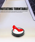 Stunning 360 Degree Rotating Display Stand With Electric Turntable, Adjustable Speed And Direction Control Via Remote, USB Powered 22cm Platform Featuring Colorful LED Lights For Pro Product Photography And Live Streaming showcasing a red high heel shoe.
