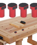 Set of four red aluminum bench dogs clamps for precise stock handling on workbench with 19mm holes.