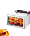 Heavy Duty Electric Food Dehydrator With Six Stainless Steel Trays And Smart Digital Timer showing dried fruit in trays.