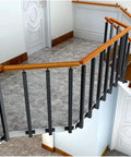 Heavy Duty Square Metal Stair Railing Balustrade Kit For Decks And Porches showcasing black metal railings on a stair landing.