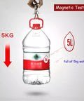 Plastic water jug weighing 5kg hanging from a magnetic hook, demonstrating magnetic strength with red and white labels.