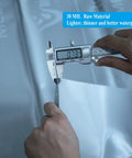 Person measuring PVC Shower Pan Liner 30 mil thick in grey with calipers, illustrating material thickness for no fuss install.