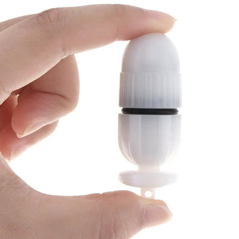 Person holding a compact Underwater Strobe Signal Light For Night Dives, Scuba Marker LED Safety Lamp, Firefly Beacon, white color