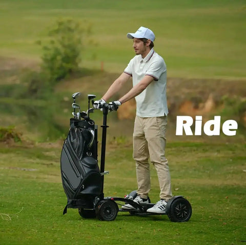 Man riding Electric Four Wheel Foldable Golf Cart Trolley With Easy Push Or Ride Options In Classic Black Trim on grass.