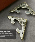 Antique Iron Triangle Corner Guards Set 20 Pcs with floral design for furniture and memorabilia boxes, vintage look.