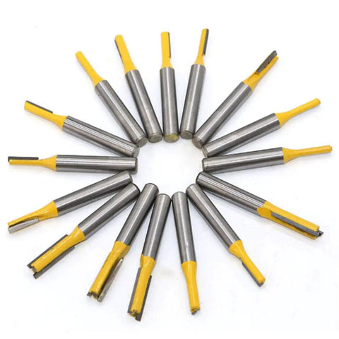 Knockout 100 Piece Router Bit And Chisel Set With 1/4 Shank showing 15 router bits with yellow tips for tongue groove trimming.