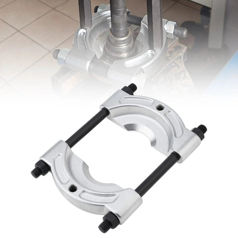 Heavy-duty bearing puller tool with two silver clamp jaws and black rods for wheel hub and pulley removal