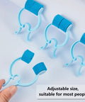 Front view of 4 blue plastic nose clips with foam cushions for stopping nosebleeds.