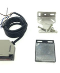Retroreflective Photoelectric Beam Sensor Switch 12-24V DC, 4m Detection Range, shown with reflector panel and mounting hardware