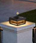 Solar Post Light 7.9 Inch Outdoor Column Lamp Weatherproof Aluminum Dusk To Dawn 3000K Warm White Waterproof IP54 For Fence Deck Cap Patio LED Landscape Lighting For Driveway Path Yard Posts on a stone pillar at dusk.