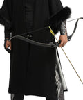 Person holding a bow with 28 Inch Carbon Arrows For Target And Hunting, Spine 500, 0.309 Inch Outer Diameter.