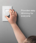 Child's hand using Smart Dimmer Switch For Paddle Decorator Switches Keeps Philips Hue Bulbs In Ready Mode So You Always Have Hue Control And Converts Your Existing Switch Into A Hue Friendly Dimmer White on wall.
