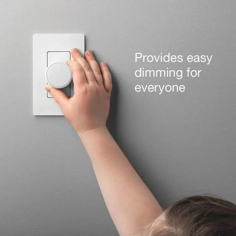 Child's hand using Smart Dimmer Switch For Paddle Decorator Switches Keeps Philips Hue Bulbs In Ready Mode So You Always Have Hue Control And Converts Your Existing Switch Into A Hue Friendly Dimmer White on wall.
