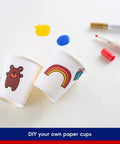 300 Pack Disposable Coffee Cups, 10 Oz White Hot Beverage Cups featuring DIY designs with bear and rainbow decorations.