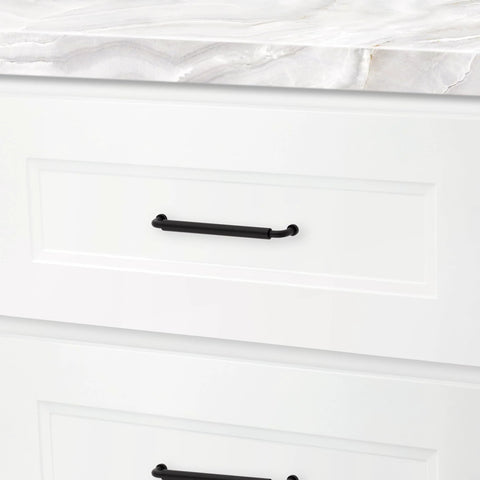 Hollywood Hills 4486 Cabinet Pull 6 Inch Center To Center Solid Brass Hardware installed on kitchen drawer in white finish