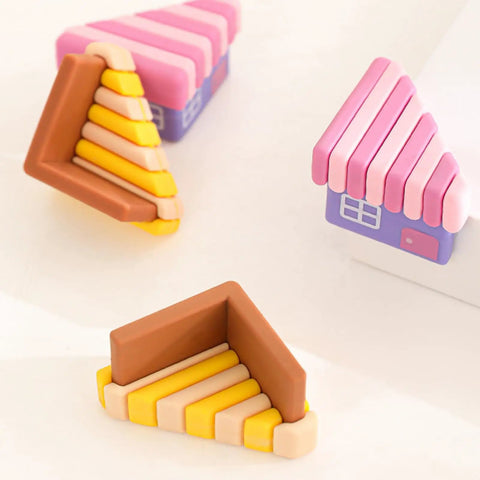 Colorful soft rubber corner guards for furniture protection, featuring striped design for kids' safety during playtime.