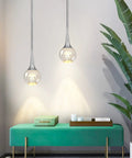 Mini Pendant Light With Dope Teardrop Crystal Jellyfish Pattern, Chrome Finish, 5W Globe LED Hanging Light over green bench