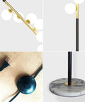 White Glass Shade Marble Base Floor Lamp with details of LED bulbs, tall black stand, marble base, and easy on/off switch