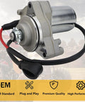 Close-up of 3 Bolt Starter Motor With Solenoid Relay And CDI For 50cc-125cc ATVs in a rugged outdoor setting