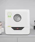 Slick Compact Countertop Dishwasher With Four Fast Wash Cycles And Chill Noise Level To Blast Dirty Dishes For Household Crews And Small Apartment Sets on a kitchen counter with clean plates.