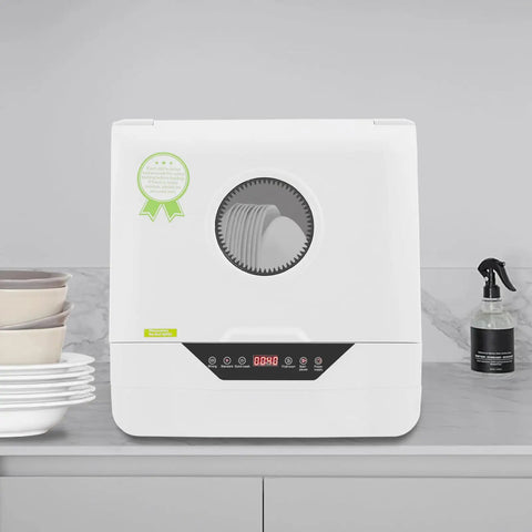 Slick Compact Countertop Dishwasher With Four Fast Wash Cycles And Chill Noise Level To Blast Dirty Dishes For Household Crews And Small Apartment Sets on a kitchen counter with clean plates.