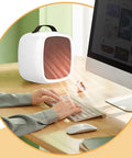 Tiny But Mighty Compact Ceramic Space Heater 500W For Home And Office Quiet Desk Heater With Overheat Protection Cozy Up Warmth Safe Yellow Portable Desk Companion For Desktop And Small Rooms on desk beside computer