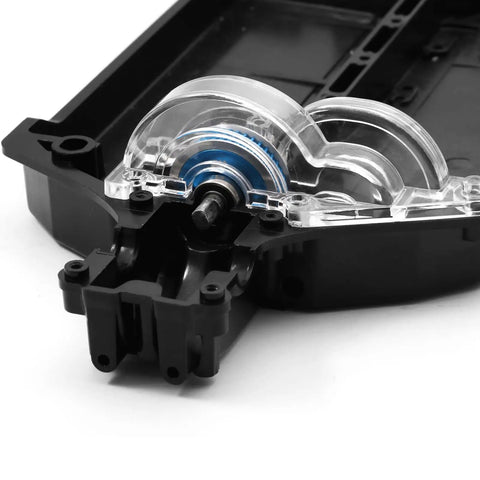 Transparent Spur Gear Covers For 1X10 RC Car TT02 installed on black chassis, showing internal gears through clear plastic, close-up view.