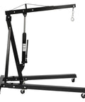 Smooth Operator Heavy Duty Hydraulic Engine Hoist Crane 2 Ton Shop Lift Rig, black steel with rolling caster wheels.