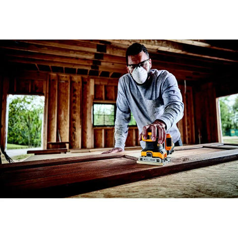 Man using Cordless Quarter Sheet Sander Kit With Brushless Motor Variable Speed 8000 To 14000 OPM 20V Max XR 2.0Ah Battery