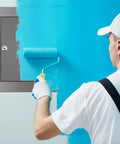 Tough As Nails 8 X 8 Inch Stainless Steel Access Panel With No Sweat Screwdriver Latch being painted in blue on drywall.