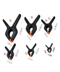 Assorted sizes of versatile nylon spring clamps for woodworking and home use, toggle clip clamp for wood projects, plastic clamp.