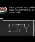 Magnetic Golf GPS Speaker with 20W Woofer and 10W Tweeter, distances visible on screen, clip on remote next to speaker.