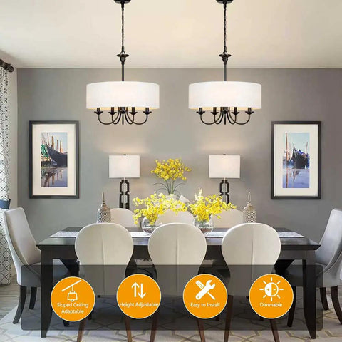 Dining room with two Traditional 5 Light Chrome Drum Chandeliers With White Linen Shade, showcasing adjustable hanging height.