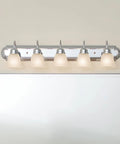 Five Light Bathroom Vanity Fixture, Traditional 36-Inch Bar With Satin Etched Glass Shades In Tannery Bronze over mirror