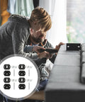 Two people installing Heavy Duty Sectional Sofa Connectors Twenty Pack Metal Interlocking Alligator Pins on a couch.